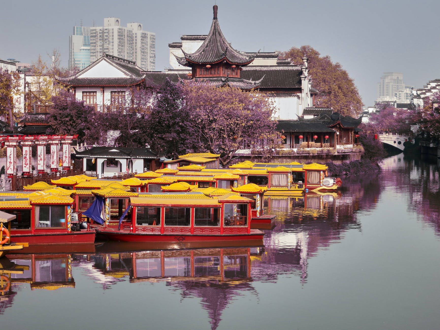 chinese traditional boats on water near the confucius temple area in nanjing china