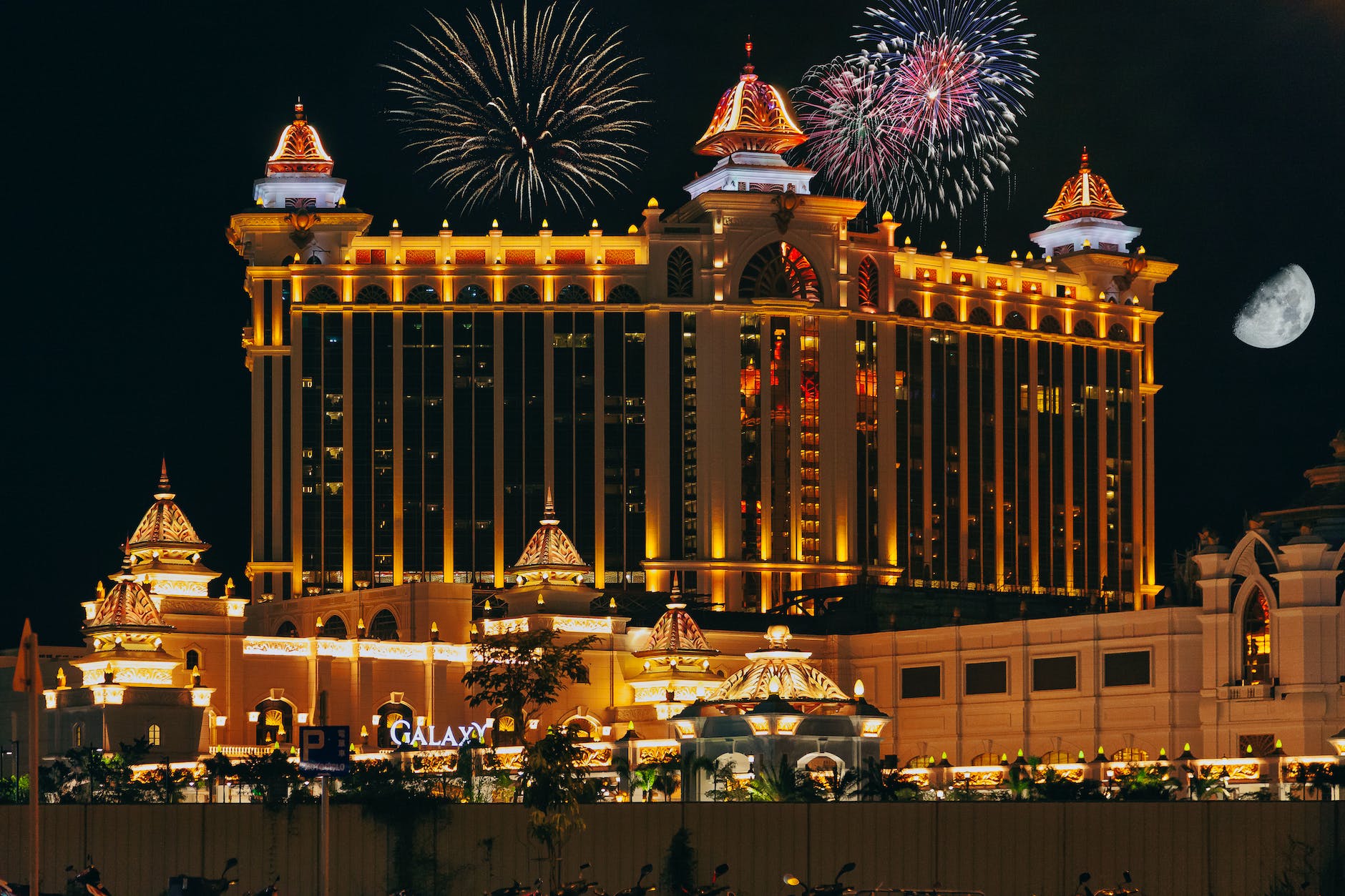 exterior of modern luxury hotel complex at night